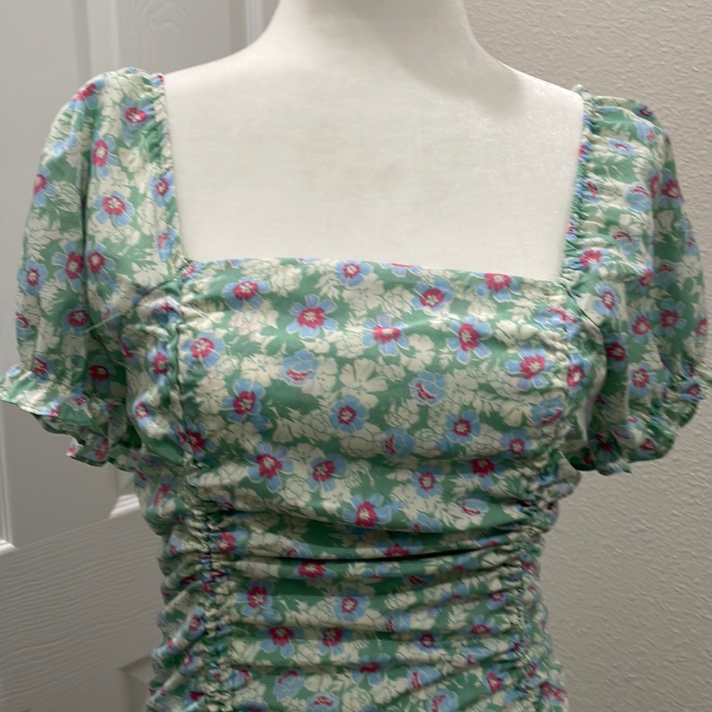 Ruched Mini Dress with puffed sleeves .